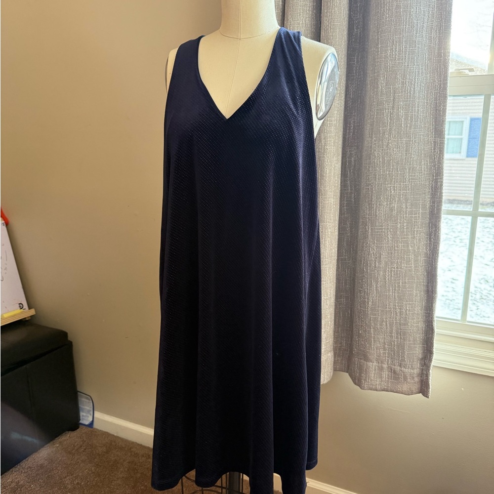 Beverly size medium, dark blue. The lure dress has some sparkle to it.